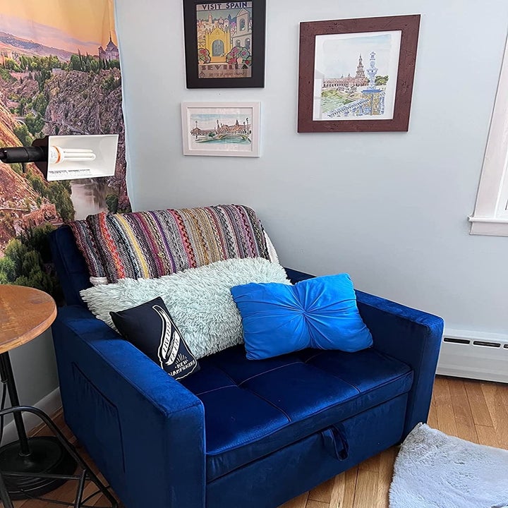 Reviewer image of the blue chair in a corner