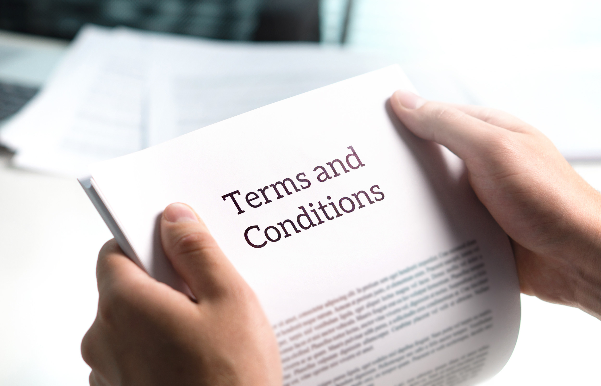Someone holding &quot;Terms and Conditions&quot;