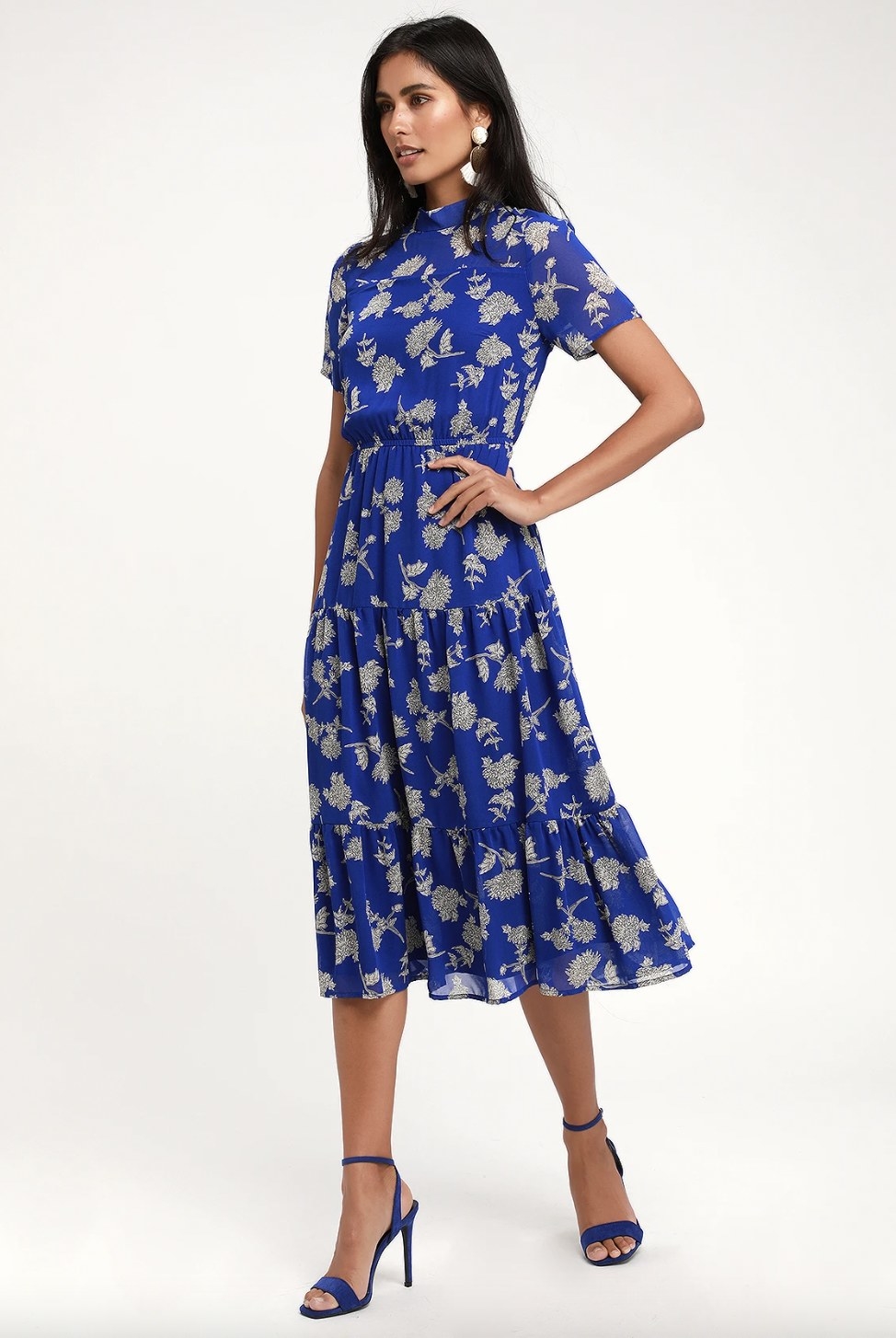 A model wearing the dress in blue