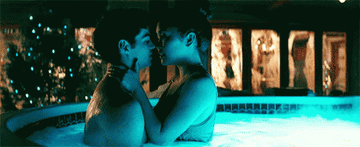 Peter and Lara Jean kissing in the hot tub