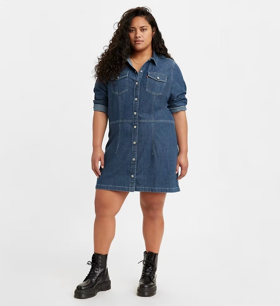 A model in the dark wash mini dress