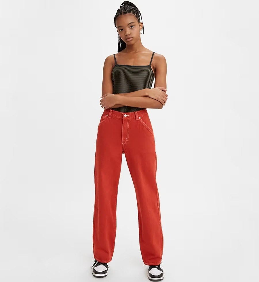 A model in the red baggy pants