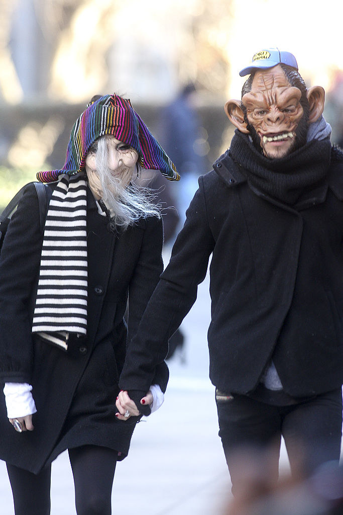 Ashlee Simpson and Pete Wentz wearing masks
