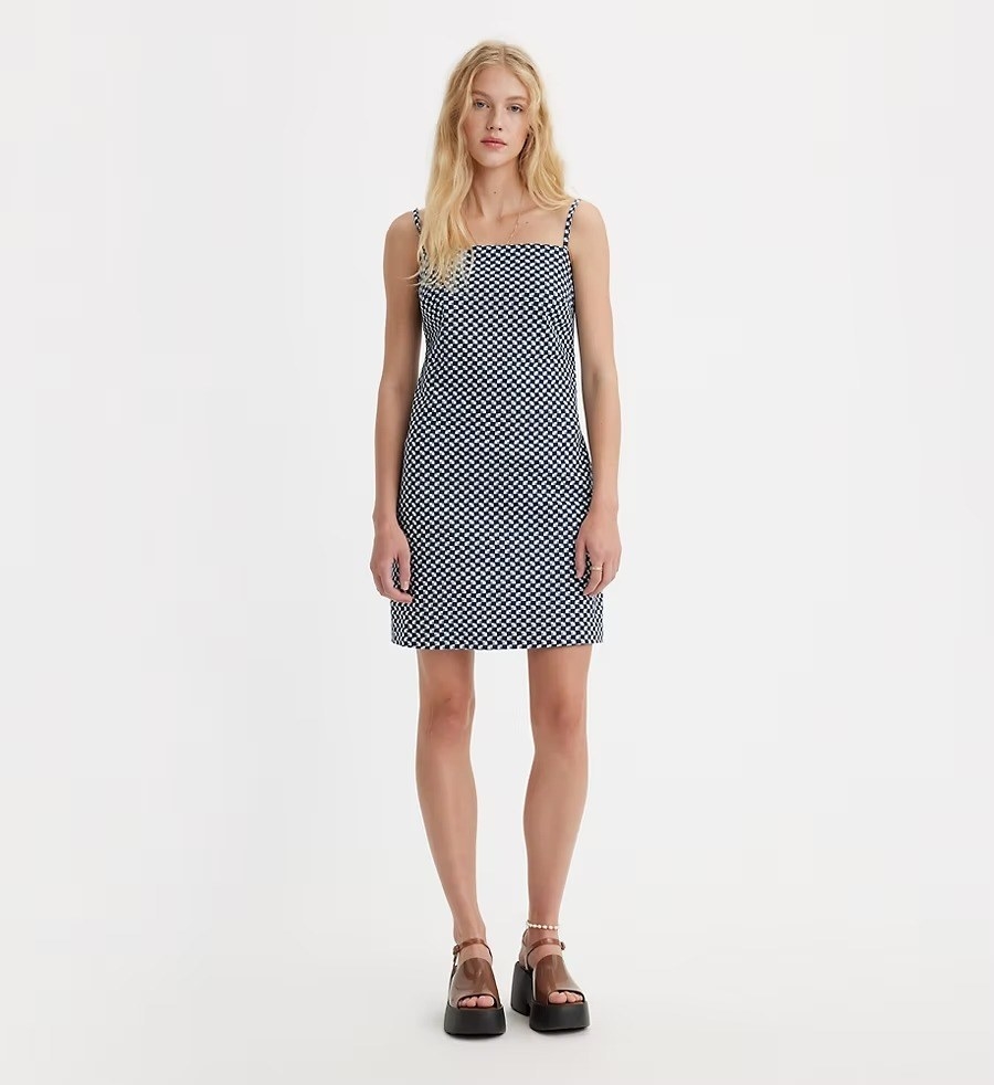 A model in the blue printed mini dress