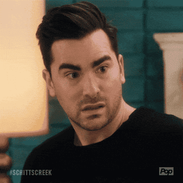 GIF of David on Schitt&#x27;s Creek with his jaw dropping