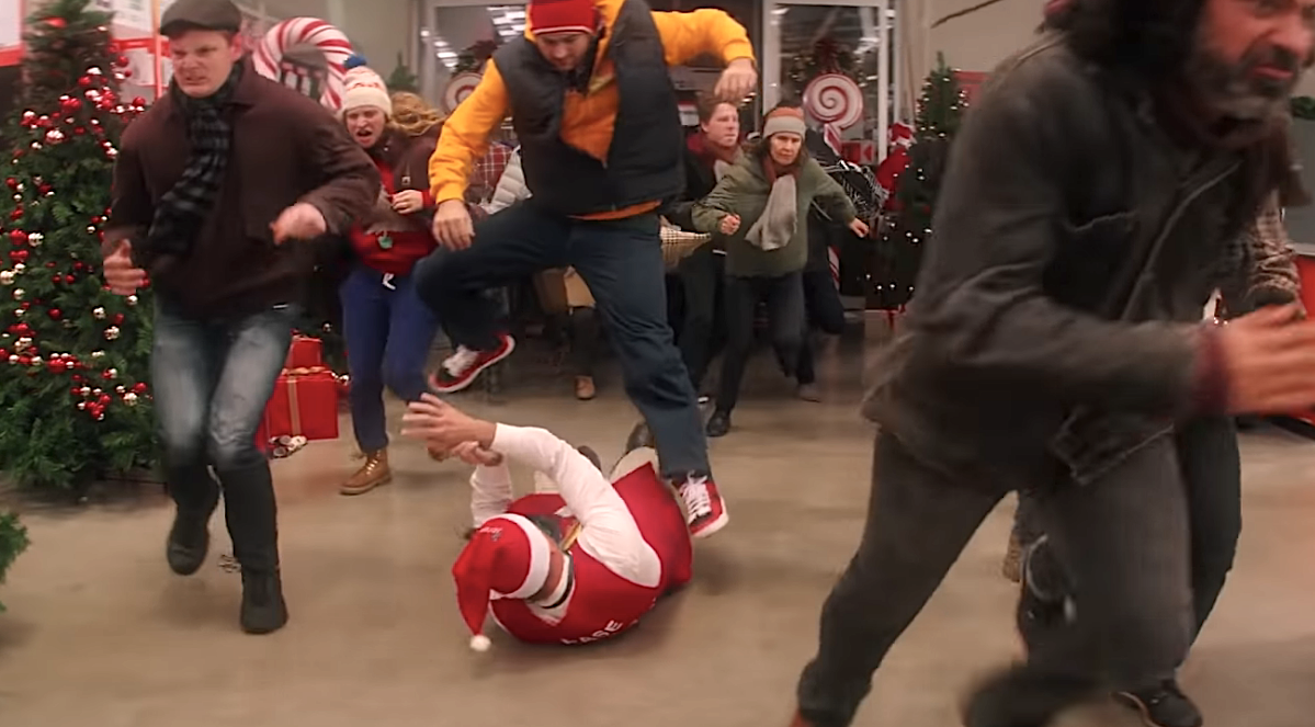 People racing into a store during the holidays