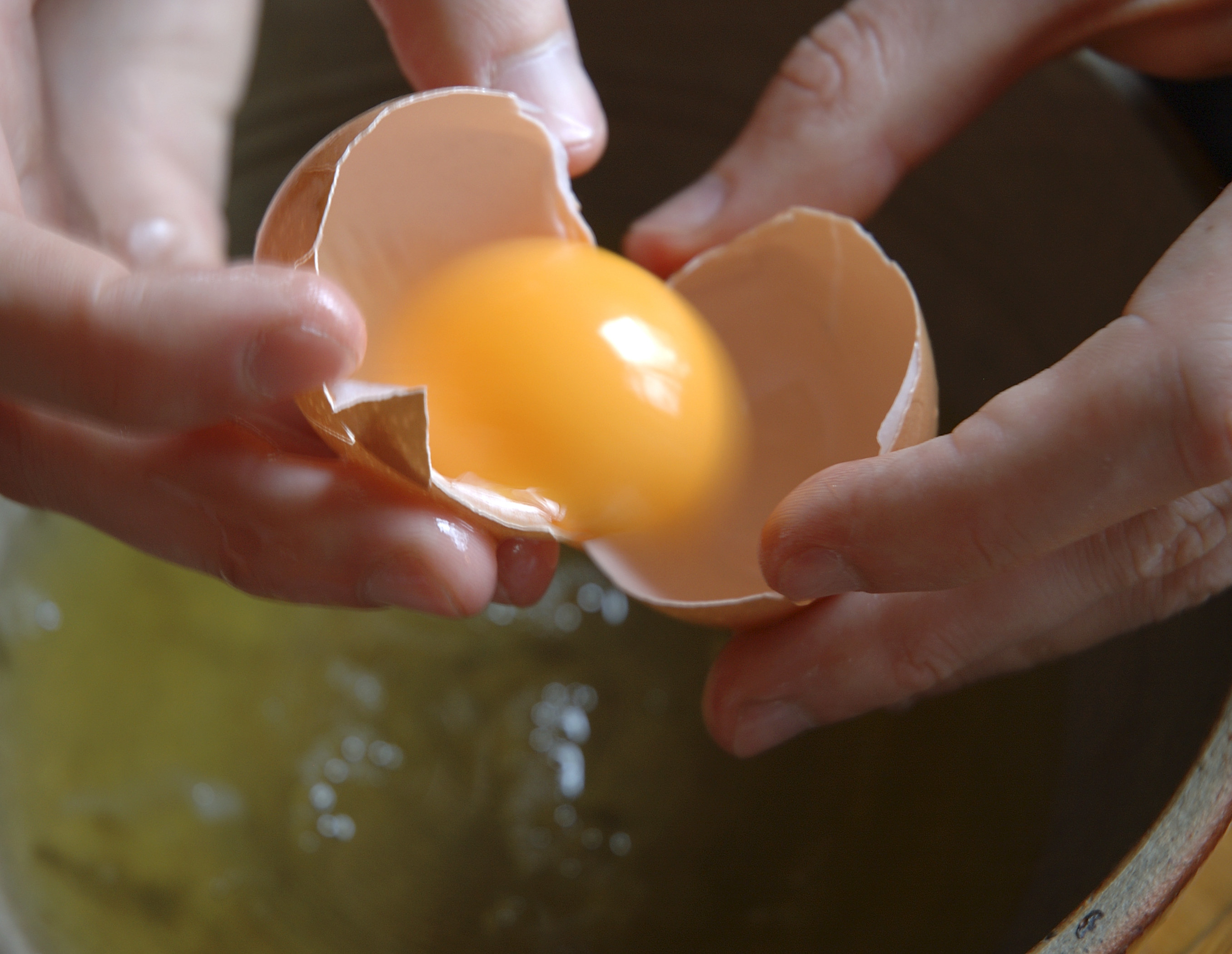 Separating egg yolk from whites.