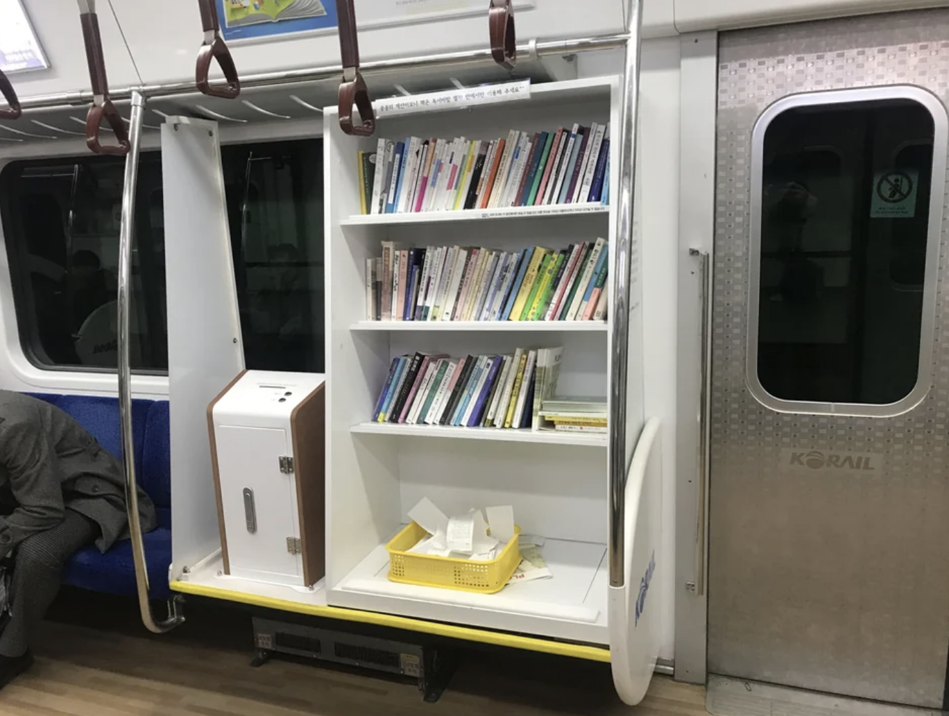 A library on a metro train