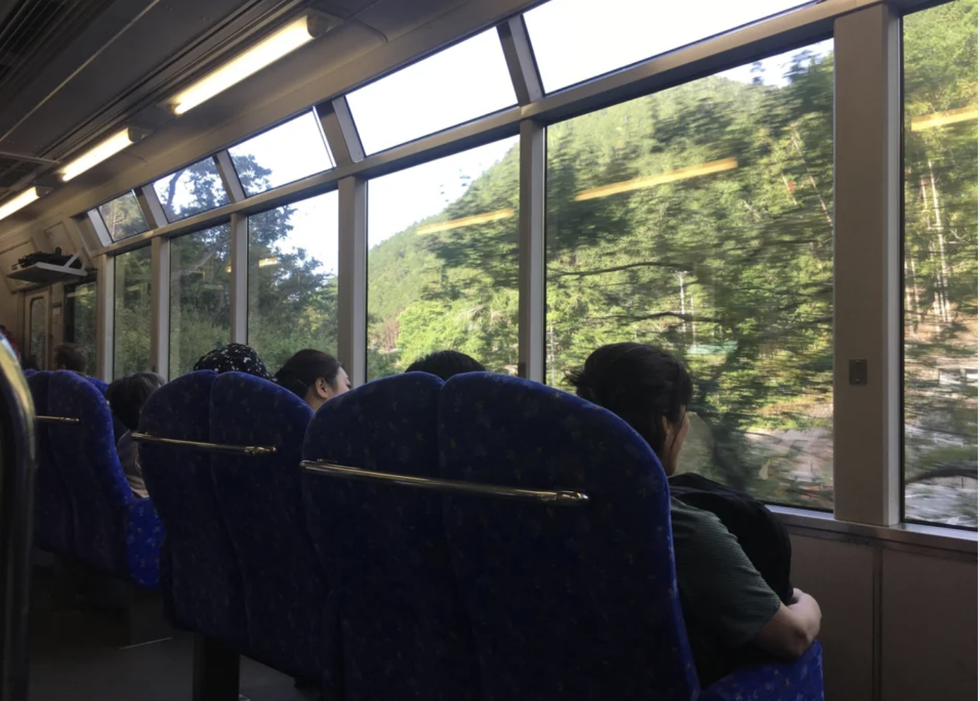 Train seats facing the windows