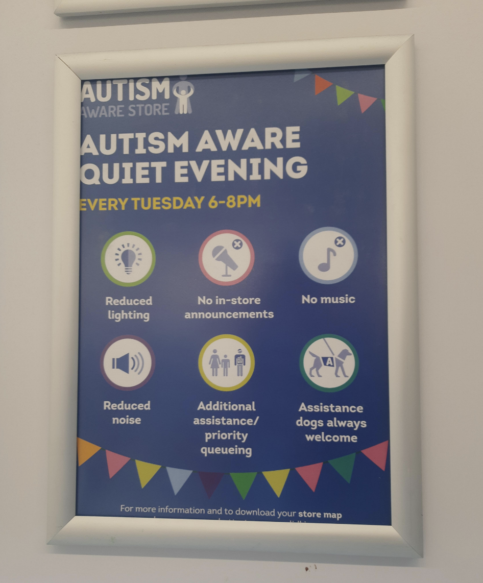 A sign for autism awareness at a store