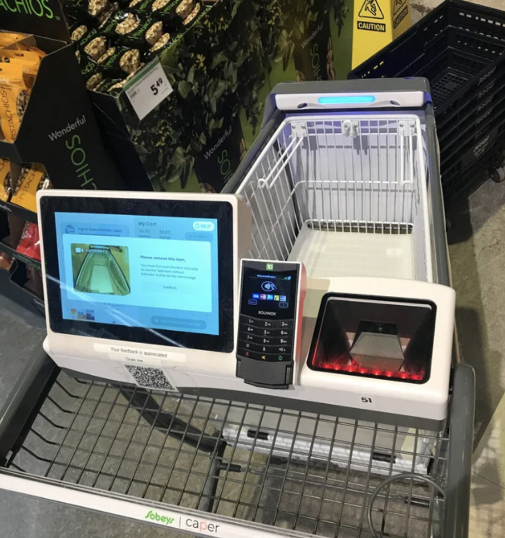 A grocery cart that you can pay for groceries on
