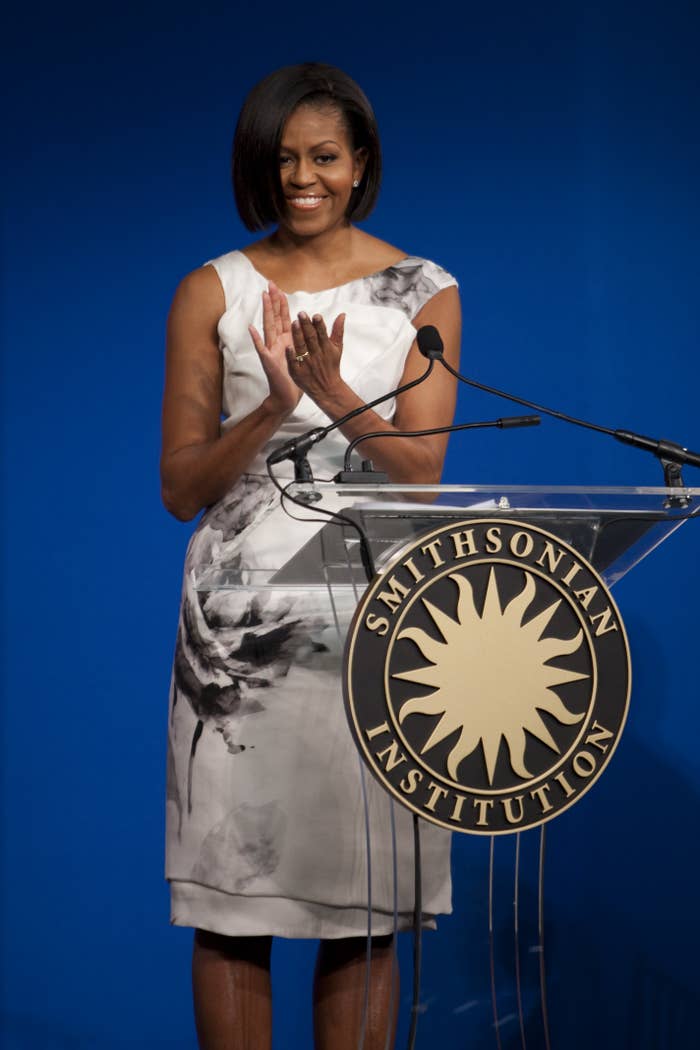 First lady Michelle Obama attends a ceremony to donate the gown that she wore to the 2009 inaugural ball to the Smithsonian&#x27;s National Museum of American History in Washington