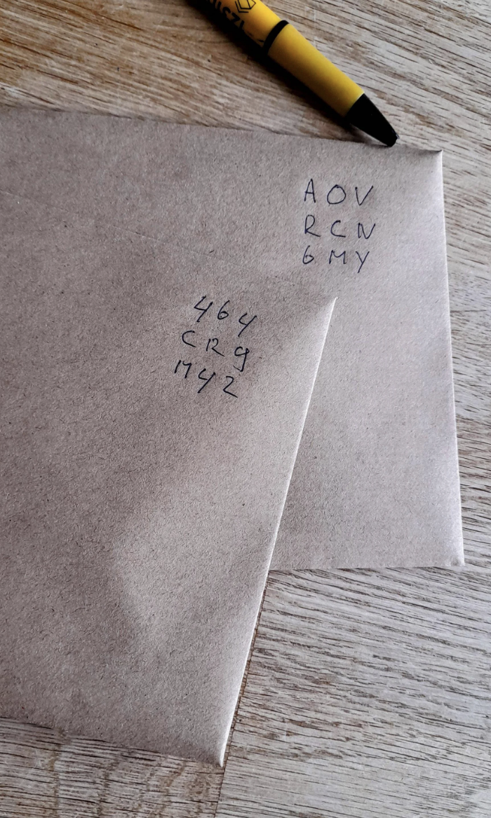 Envelopes with codes written on them instead of stamps