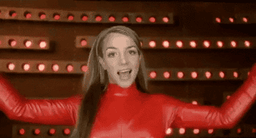 gif of Britney Spears in the music video for Oops I Did it Again