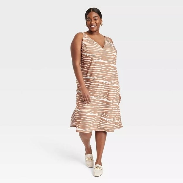 A model in the zebra print slip dress