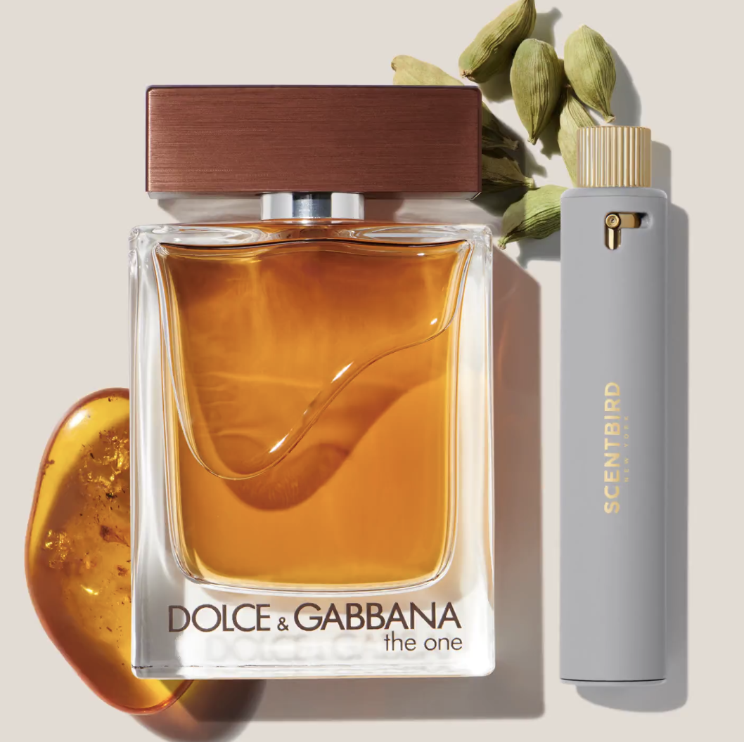 A bottle of Dolce &amp;amp; Gabbana cologne alongside a smaller sample-size case that reads Scentbird
