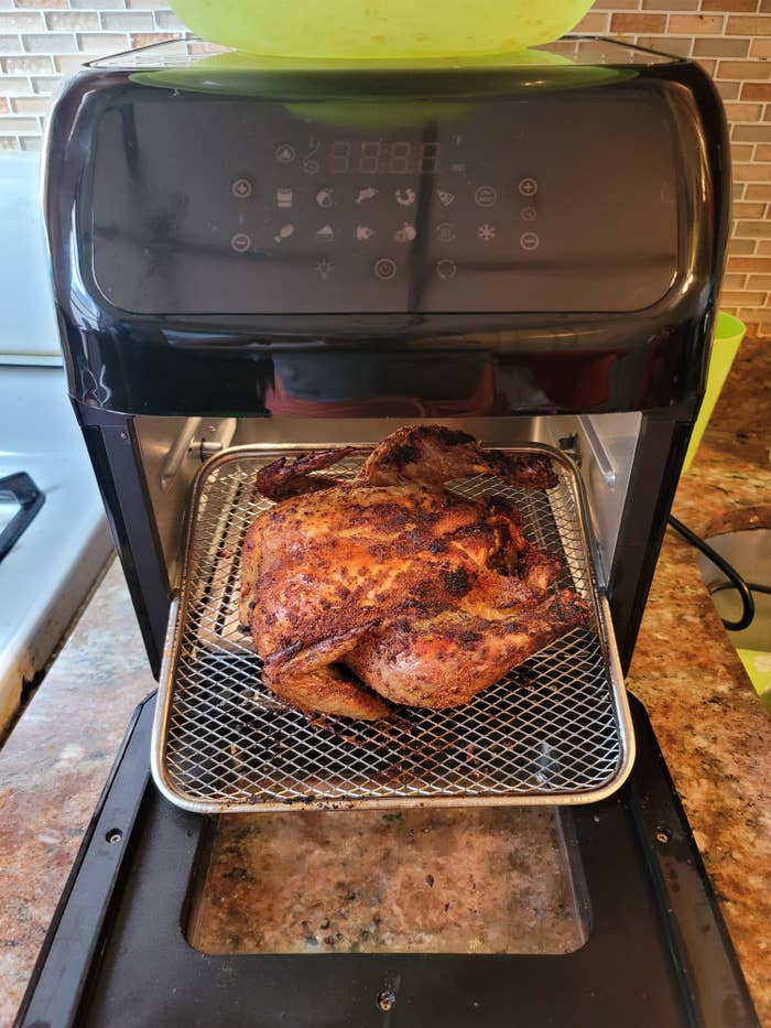 Reviewer&#x27;s air fryer oven with roast chicken