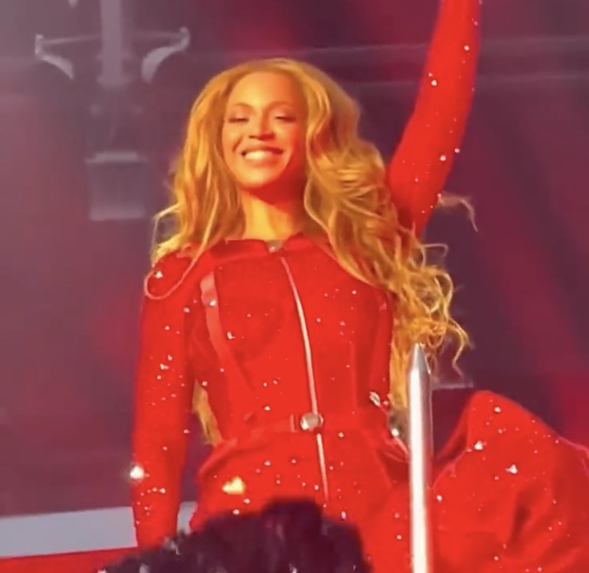 A closeup of Beyonce smiling proudly