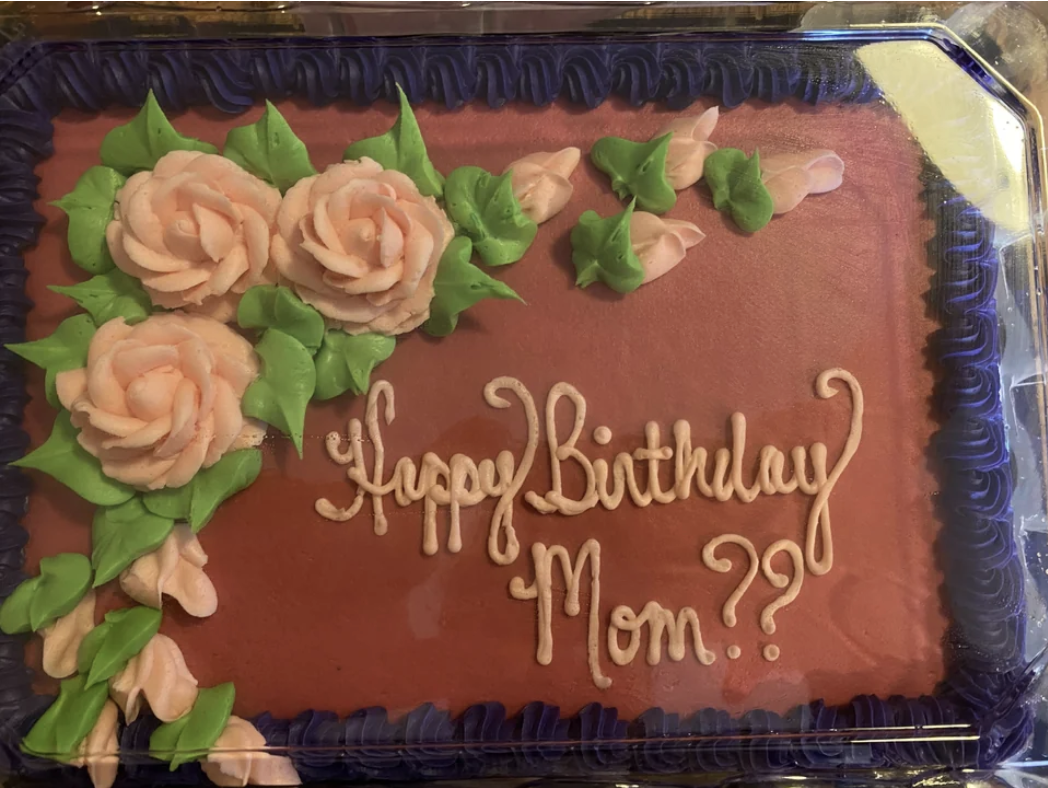 Question marks on a birthday cake