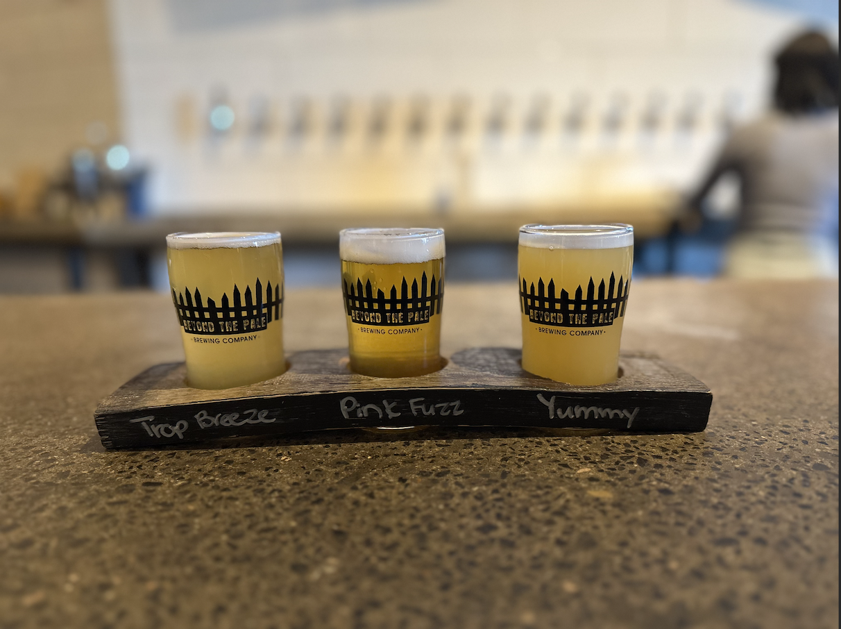 A sampler tray holds small glasses of the three above mentioned flavors