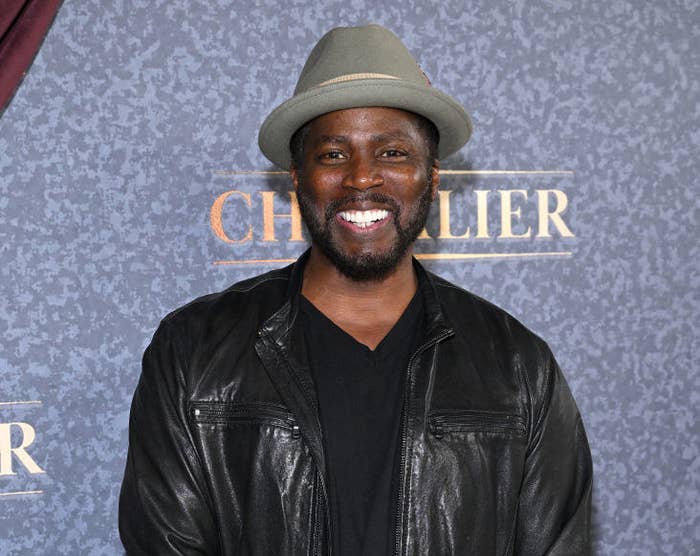 A closeup of Harold Perrineau smiling on the red carpet