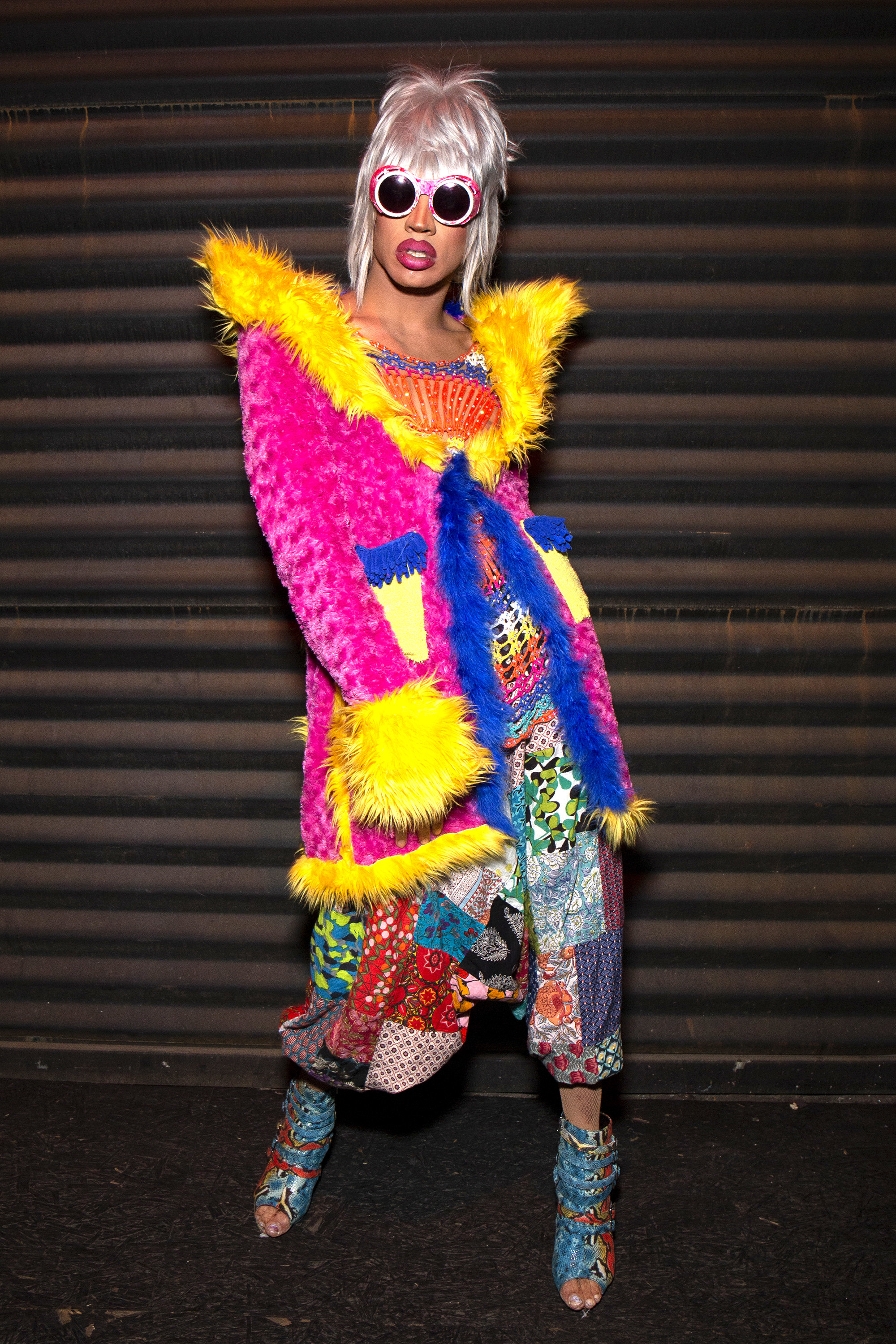 yvie oddly poses for a photo