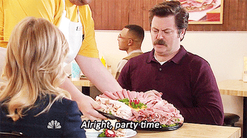 Ron Swanson being presented with a tray of lunch meat and saying &quot;Alright, party time&quot;