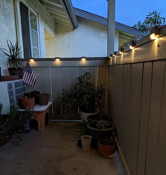 Reviewer photograph of lights connected a patio fence