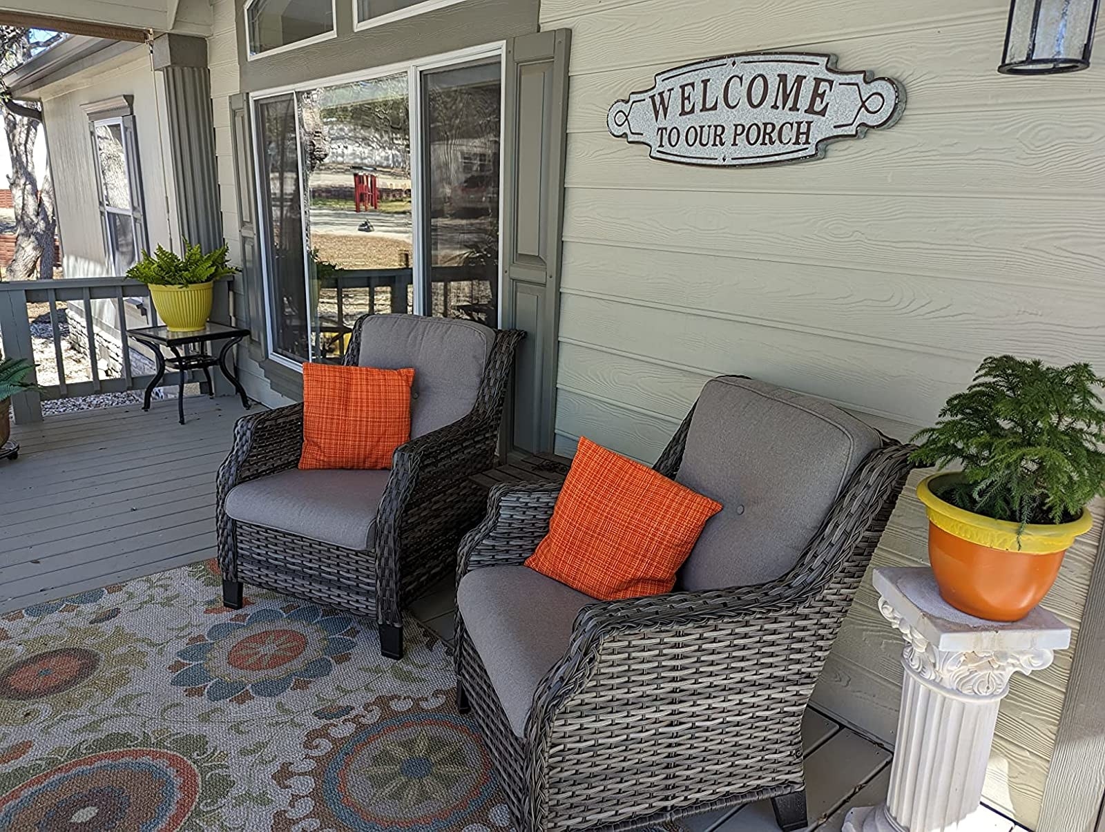 Reviewer photo of two pillows on patio chairs
