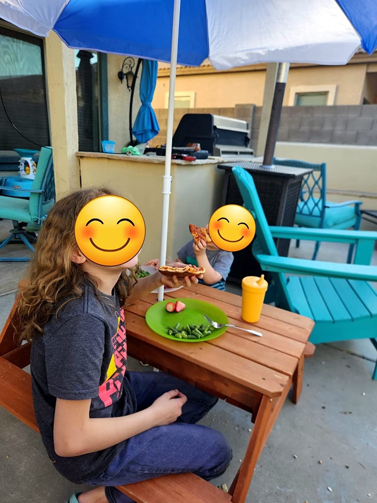 Two kids sitting at table