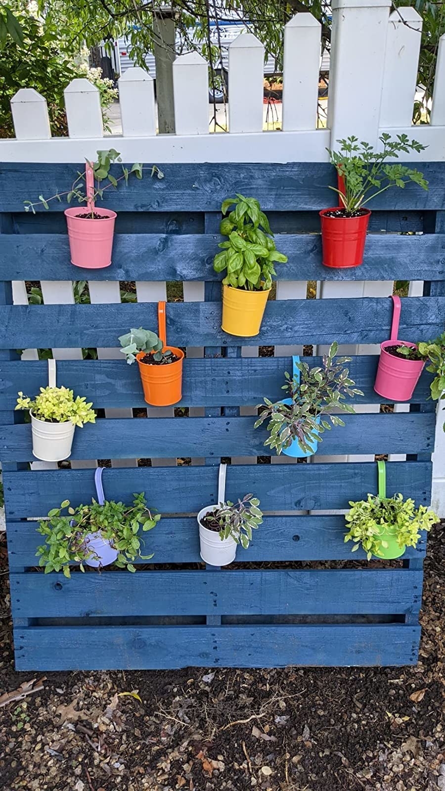 Reviewer photo of pots on a wood slat