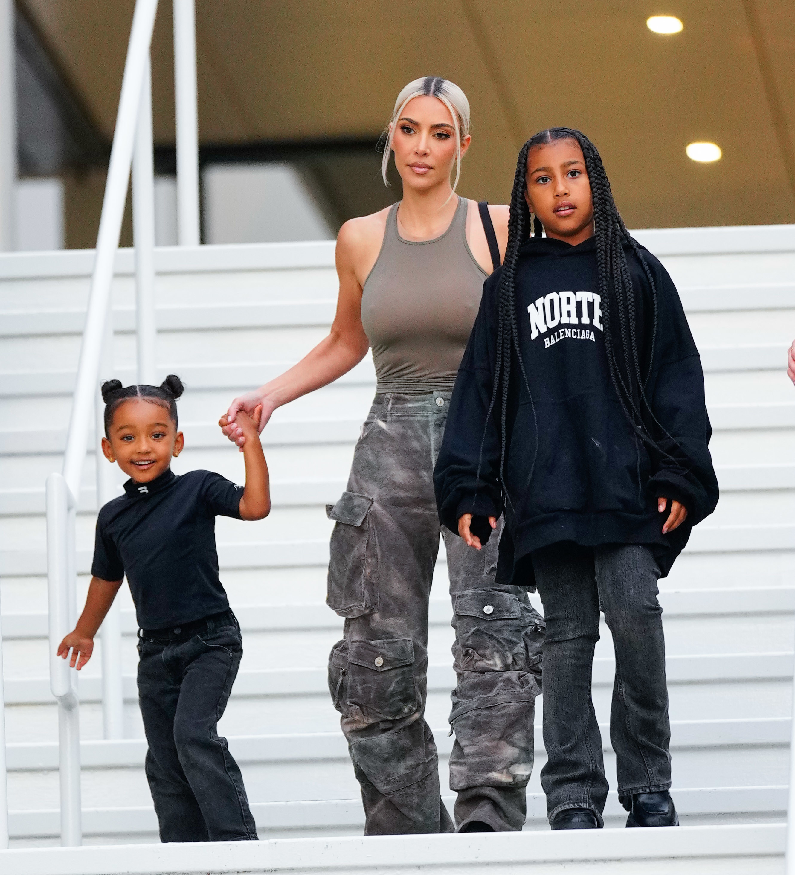 kim walking with north and chicago