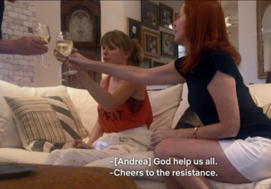 A moment from &quot;Miss Americana&quot; where people are giving a toast and someone says &quot;God help us all, cheers to the resistance&quot;