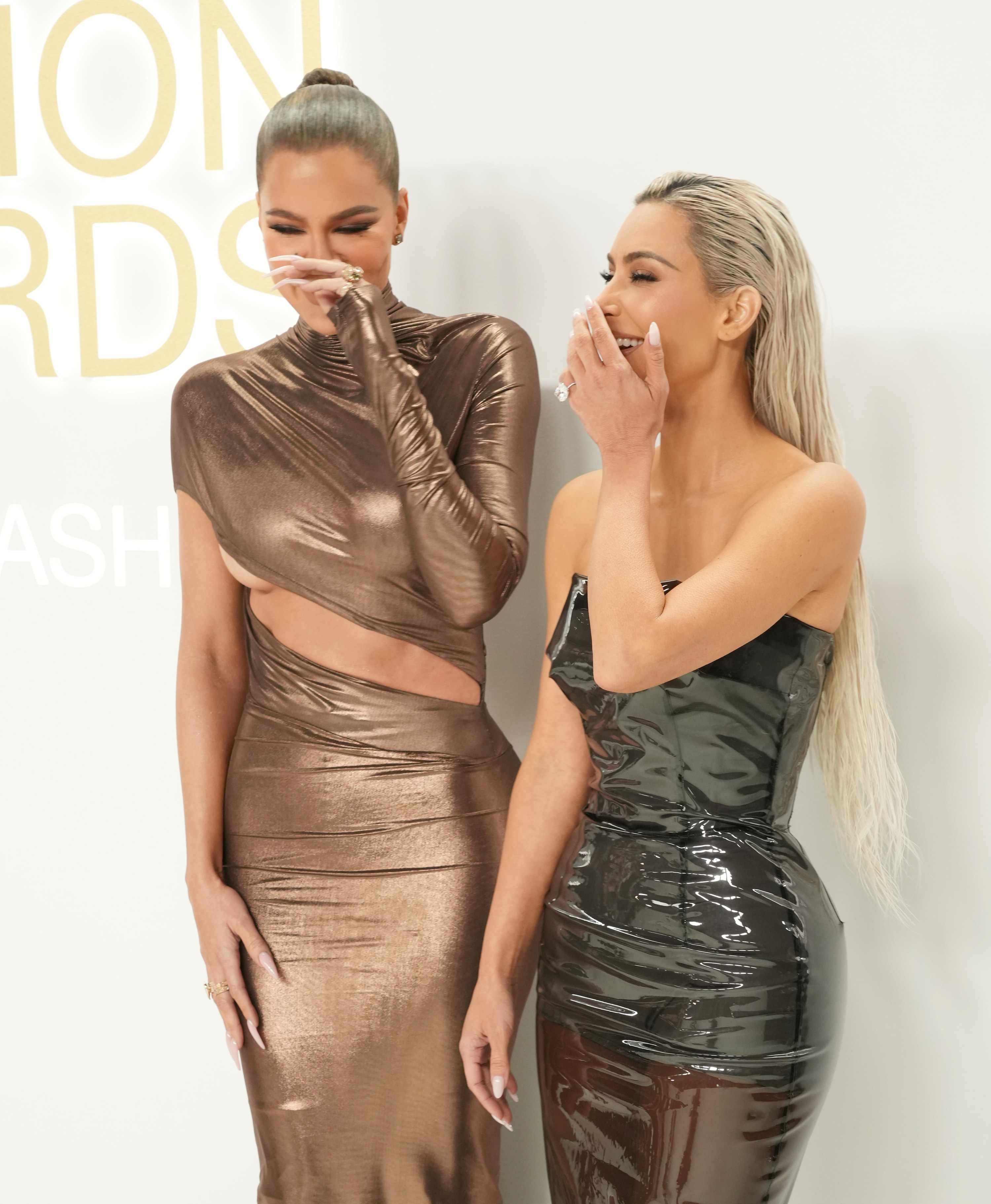 Khloé and Kim laughing