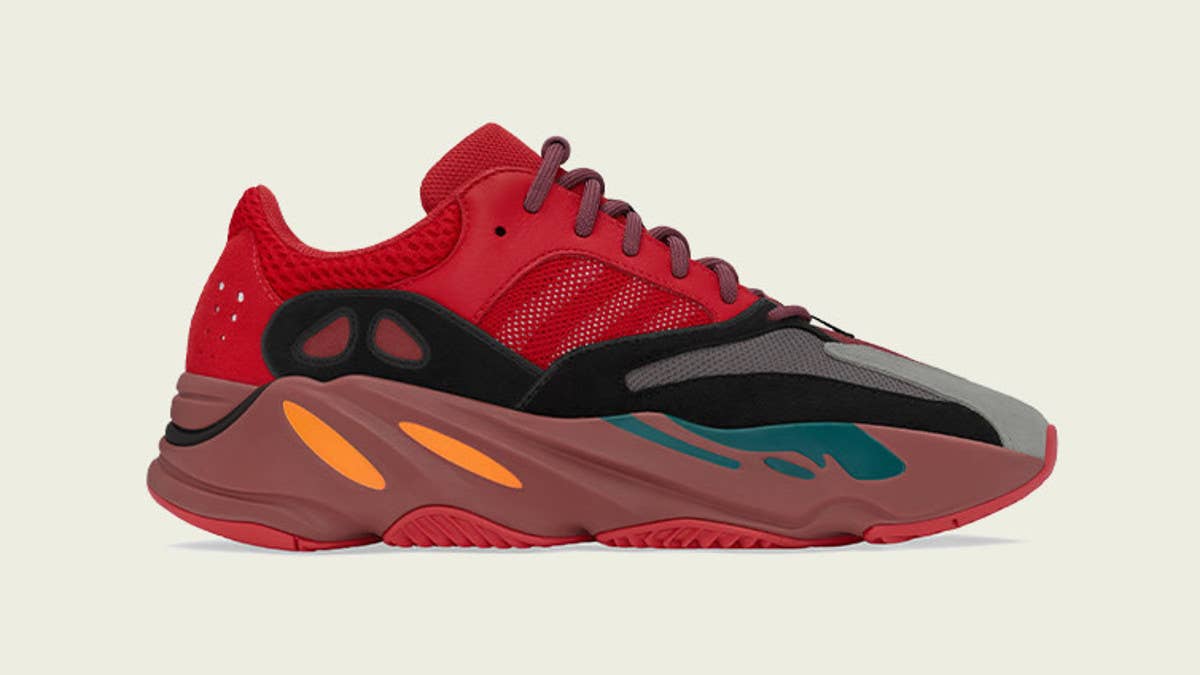 Kanye West's Adidas Yeezy Boost 700 'Hi Res Red' sees the runner remixed in a vibrant red-based colorway with black, grey, green, and orange accents.