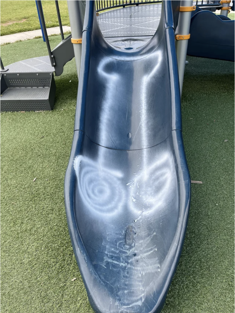 A penis panted on a slide