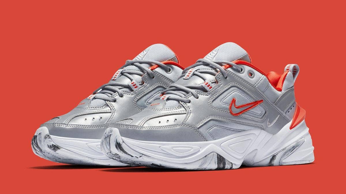 Nike's newest colorway for the M2K Tekno takes on hits of reflective silver and infrared throughout the sneaker's upper and is finished off with marbled soles.