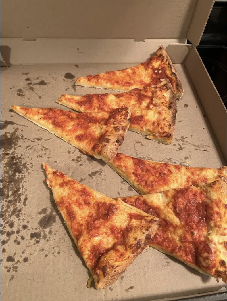 Slices of pizza with no cheese on top