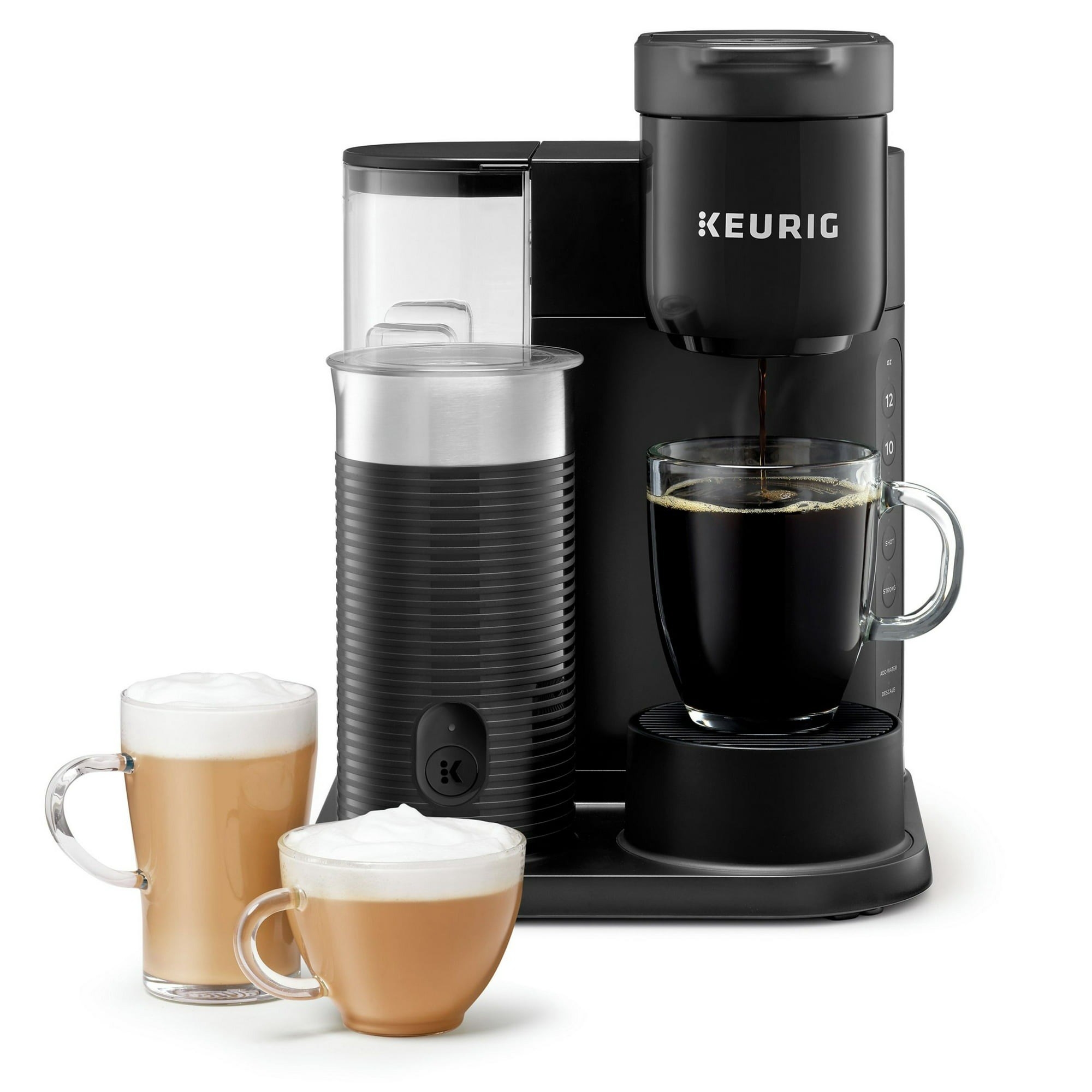 Black Keurig machine with two cappuccinos in front of it