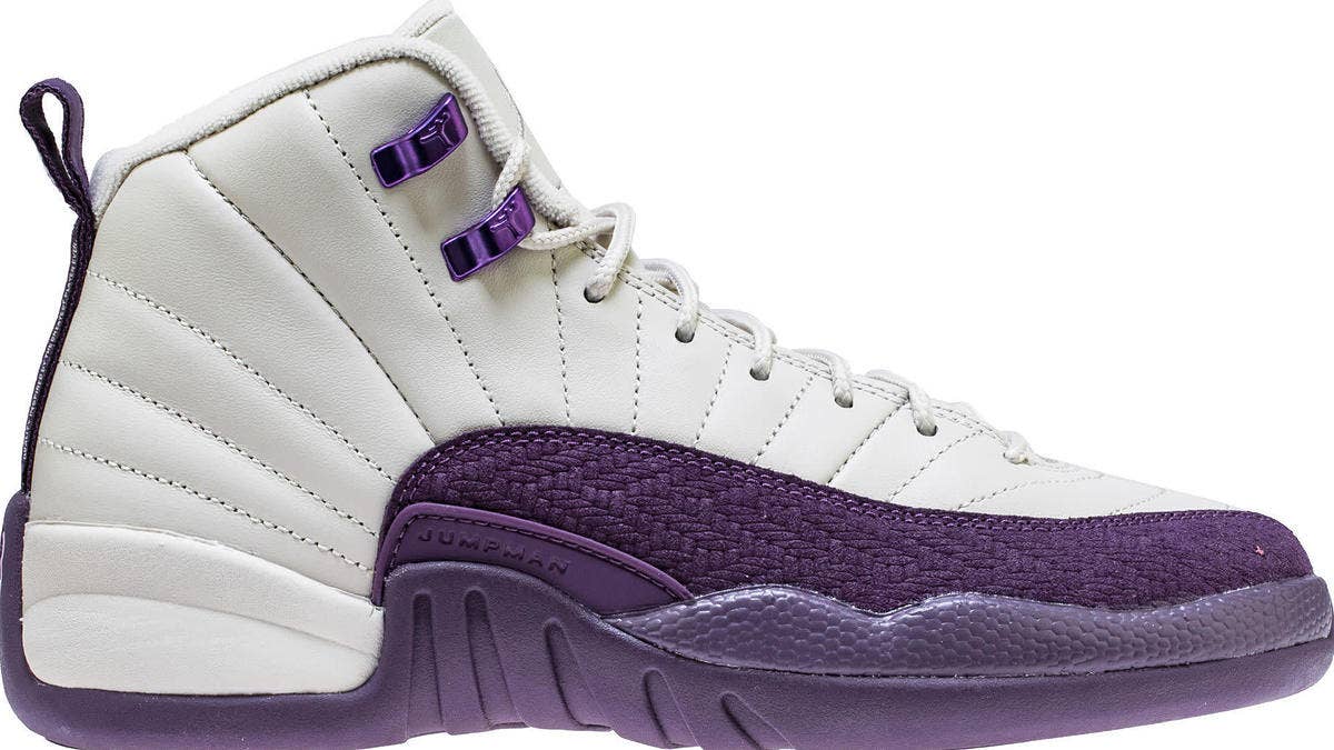 A grade-school exclusive Air Jordan 12 Retro dressed in desert sand and purple is releasing on Nov. 17, 2018 at a retail price of $140.