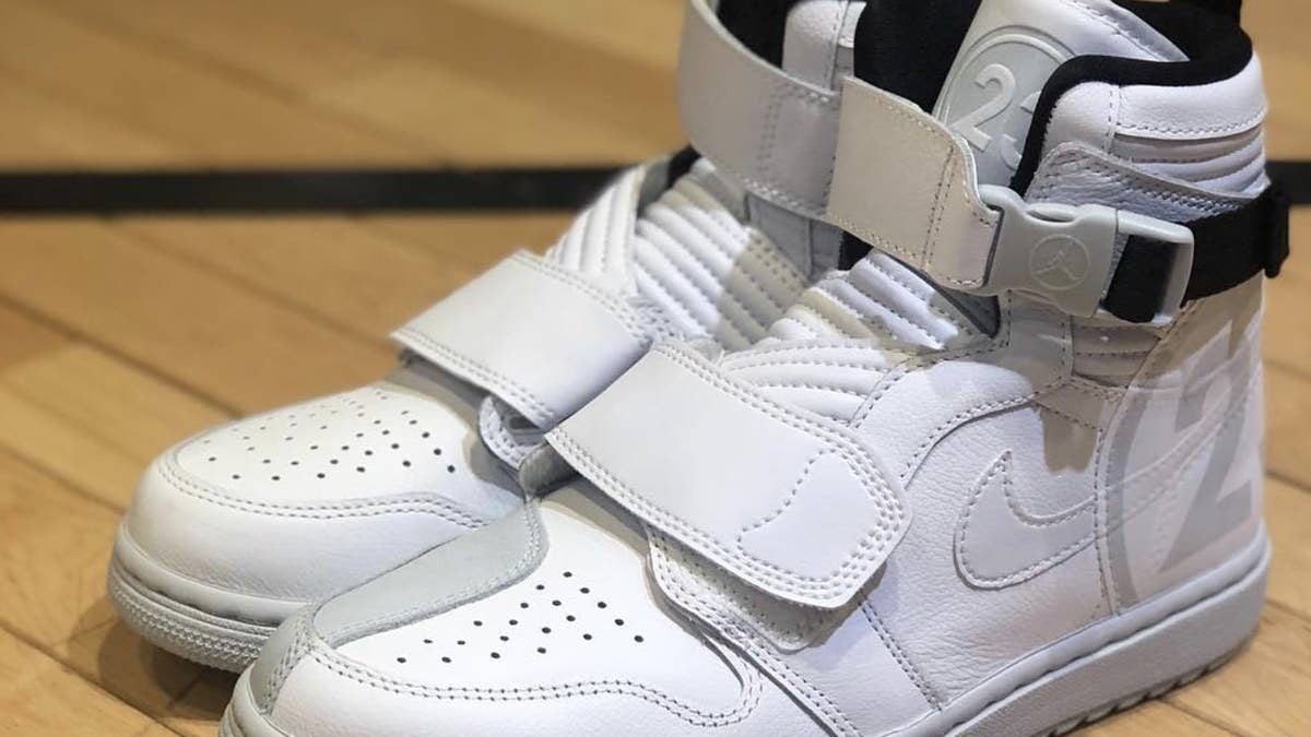 A 'Motorsports' Air Jordan 1 has surfaced online. The pair features a series of unique details including a dual strap system, new outsole, and unique branding. 