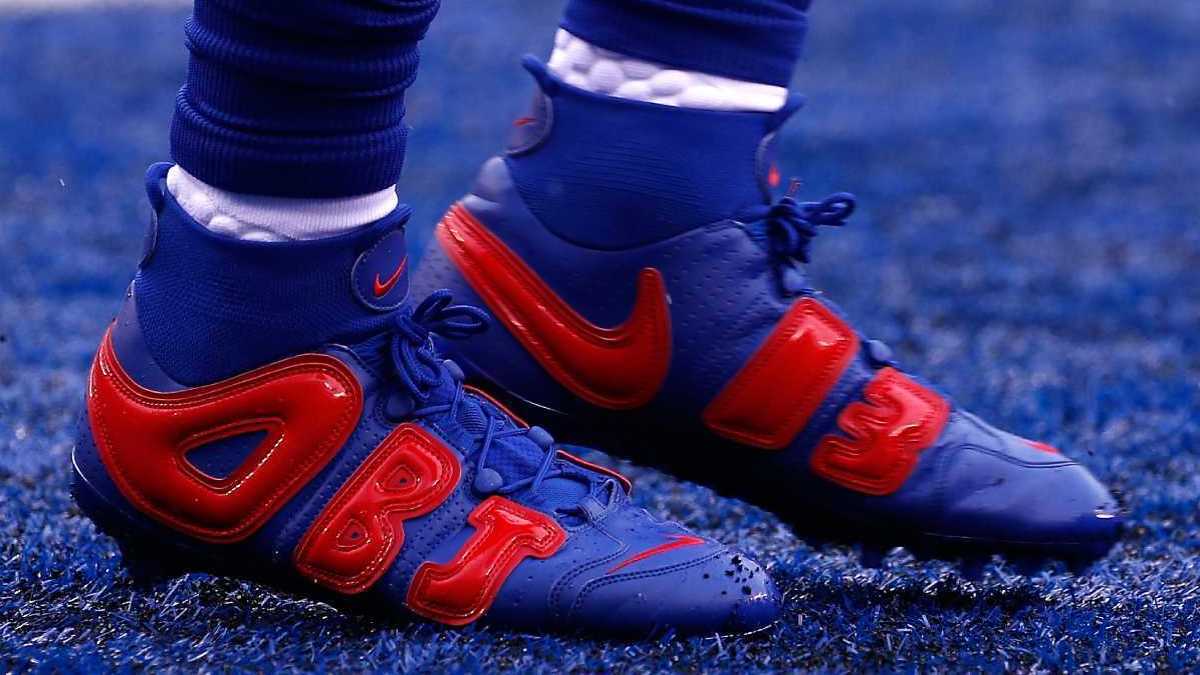 Odell Beckham Jr. began the 2018 NFL season with an all-new take on the Supreme-inspired Nike More Uptempo cleats, this time in a New York Giants-themed colorway.