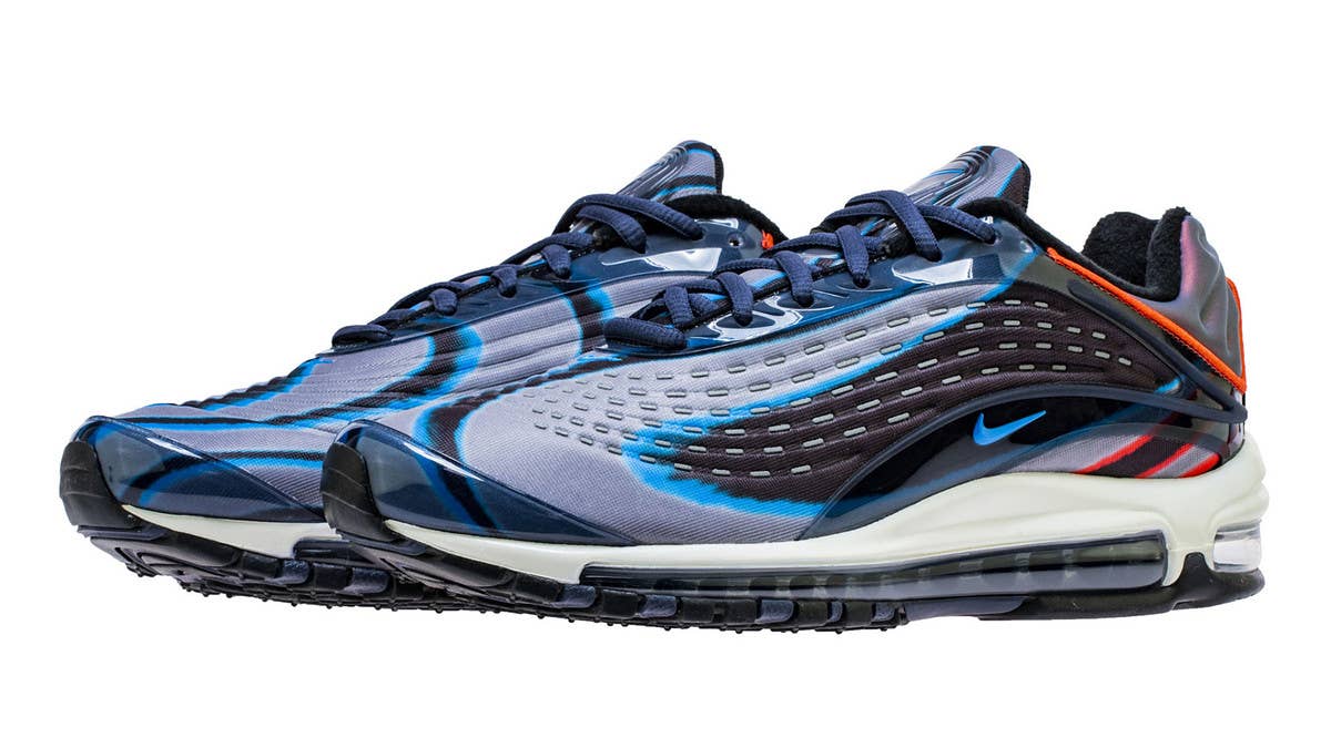 The Nike Air Max Deluxe has surfaced in a 'Thunder Blue' colorway. The pair sports various shades of blue across the patterned upper, a Foamposite heel, and red accents. 