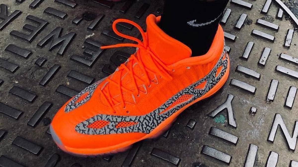 Jordan Brand NRG designer Frank Cooke shares a previously unseen Air Jordan 11 Low IE 'Orange' colorway. Find out more details about the unreleased sneakers here.