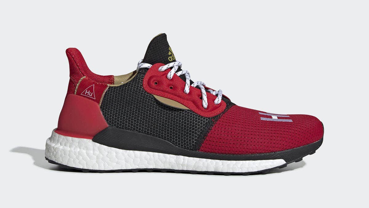 The Pharrell x Adidas Solar Hu Glide ST will be releasing in a red, black, and gold color scheme to celebrate Chinese New Year 2019. 