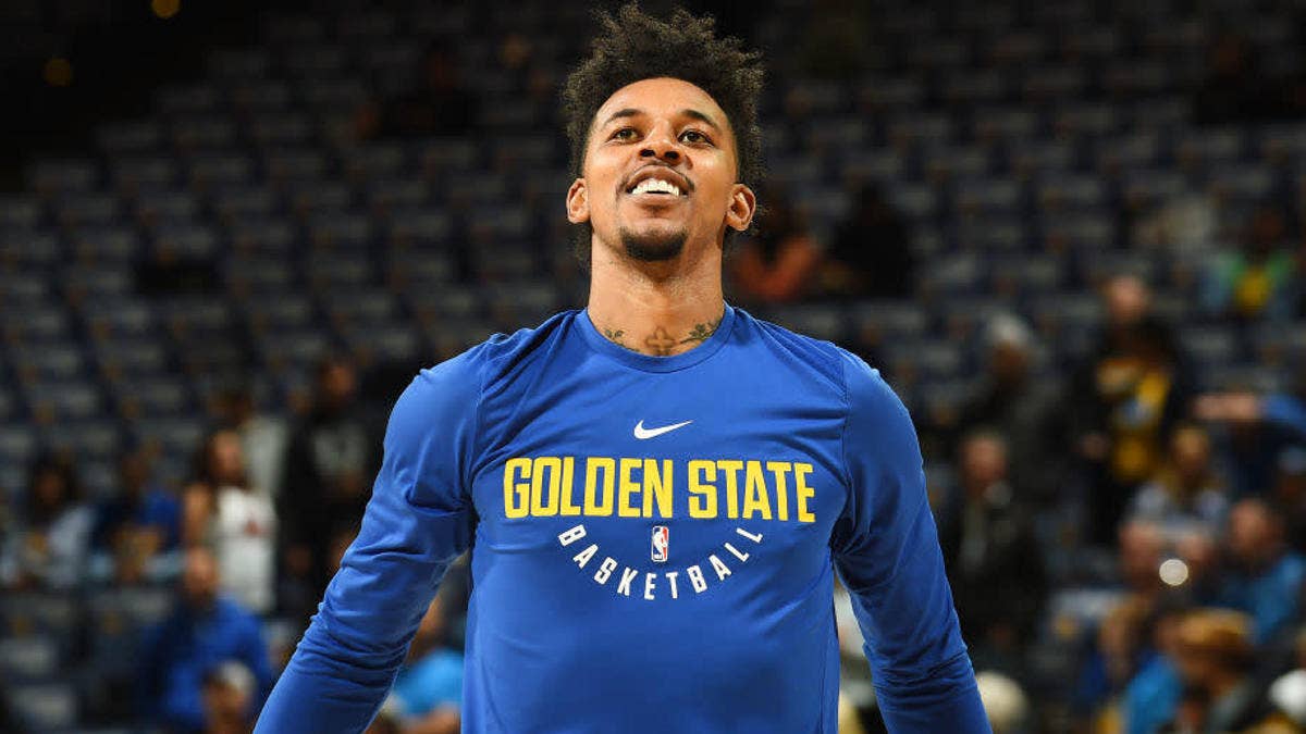 Nick Young breaks out Adidas Top Ten 2000 in Warriors colors against the Raptors.