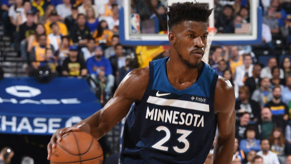 Jimmy Butler wears a camouflage Veterans Day Air Jordan 18 PE against the Golden State Warriors.