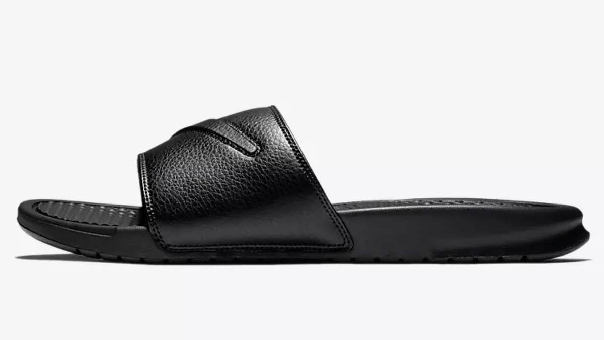Nike has released three colorways of its Benassi slides with removable velcro Swooshes.