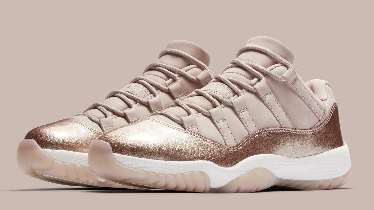 The low-top Air Jordan 11 surfaces in a new 'Rose Gold' colorway for April 2018.