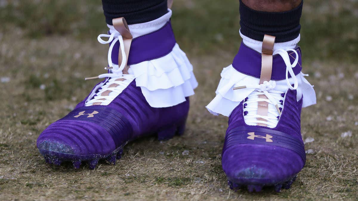 Cam Newton honors late music icon Prince with a pair of cleats that look just like his most famous outfit.